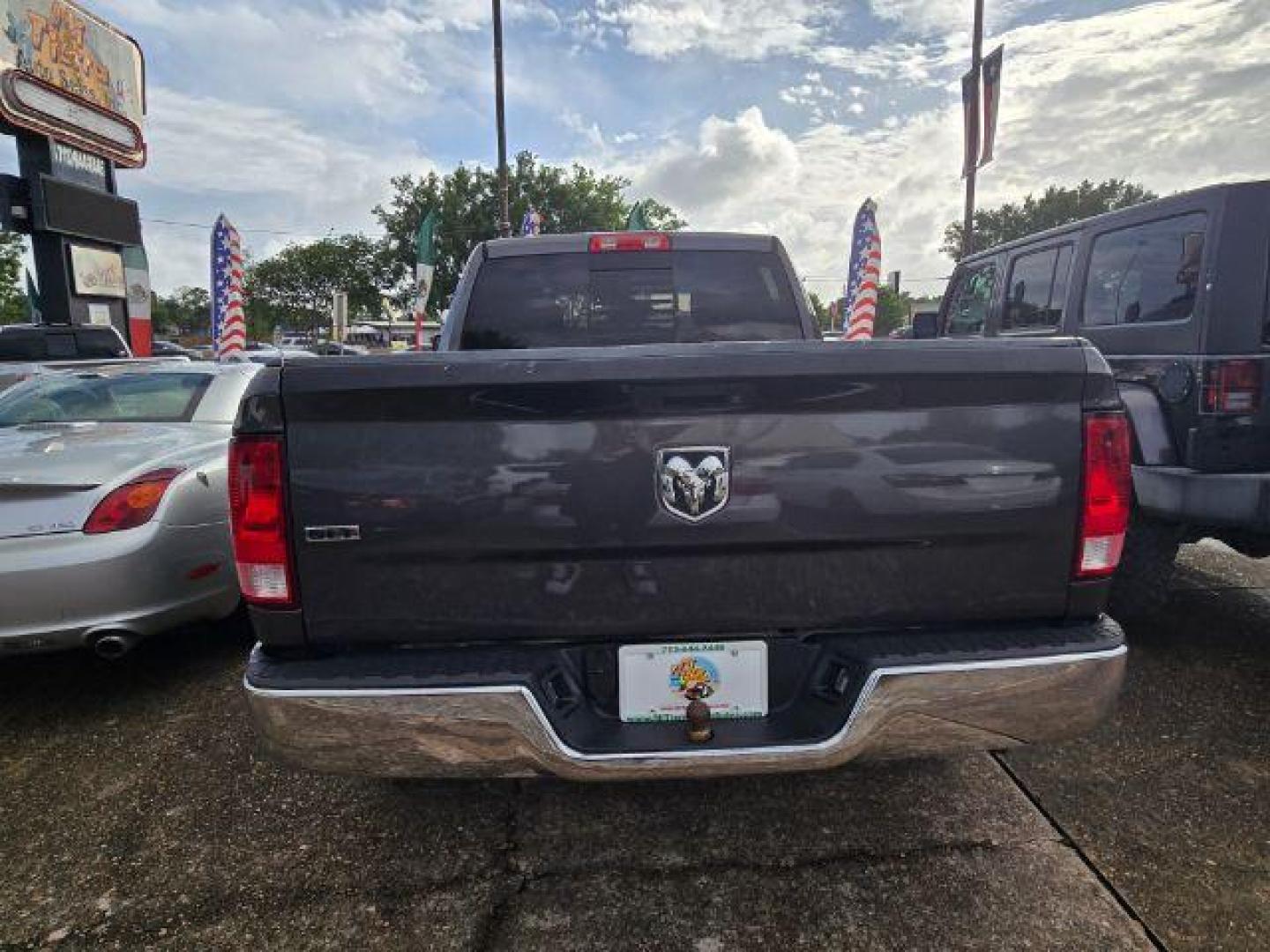 2017 Granite Crystal Metallic Clearcoat Ram 1500 SLT Quad Cab 4x2 6'4 Box (1C6RR6GG6HS) with an Pentastar 3.6L V-6 DOHC engine, located at 4545 Spencer Hwy., Pasadena, 77504, (832) 266-1645, 29.666037, -95.173775 - Photo#6