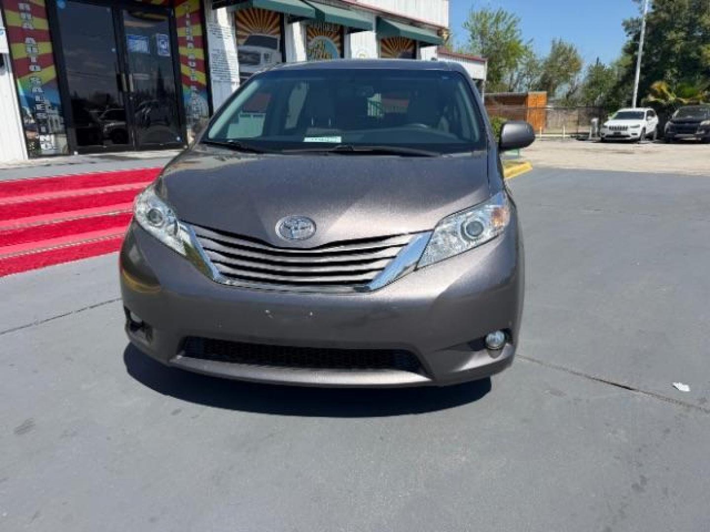2015 Silver Sky Metallic /Ash Toyota Sienna XLE 8 Passenger | XLE 7 Passenger | Limited 7 Passenger | XLE Premium 8 Pas (5TDYK3DC2FS) with an 3.5L V-6 DOHC engine, located at 4545 Spencer Hwy., Pasadena, 77504, (832) 266-1645, 29.666037, -95.173775 - Photo#1