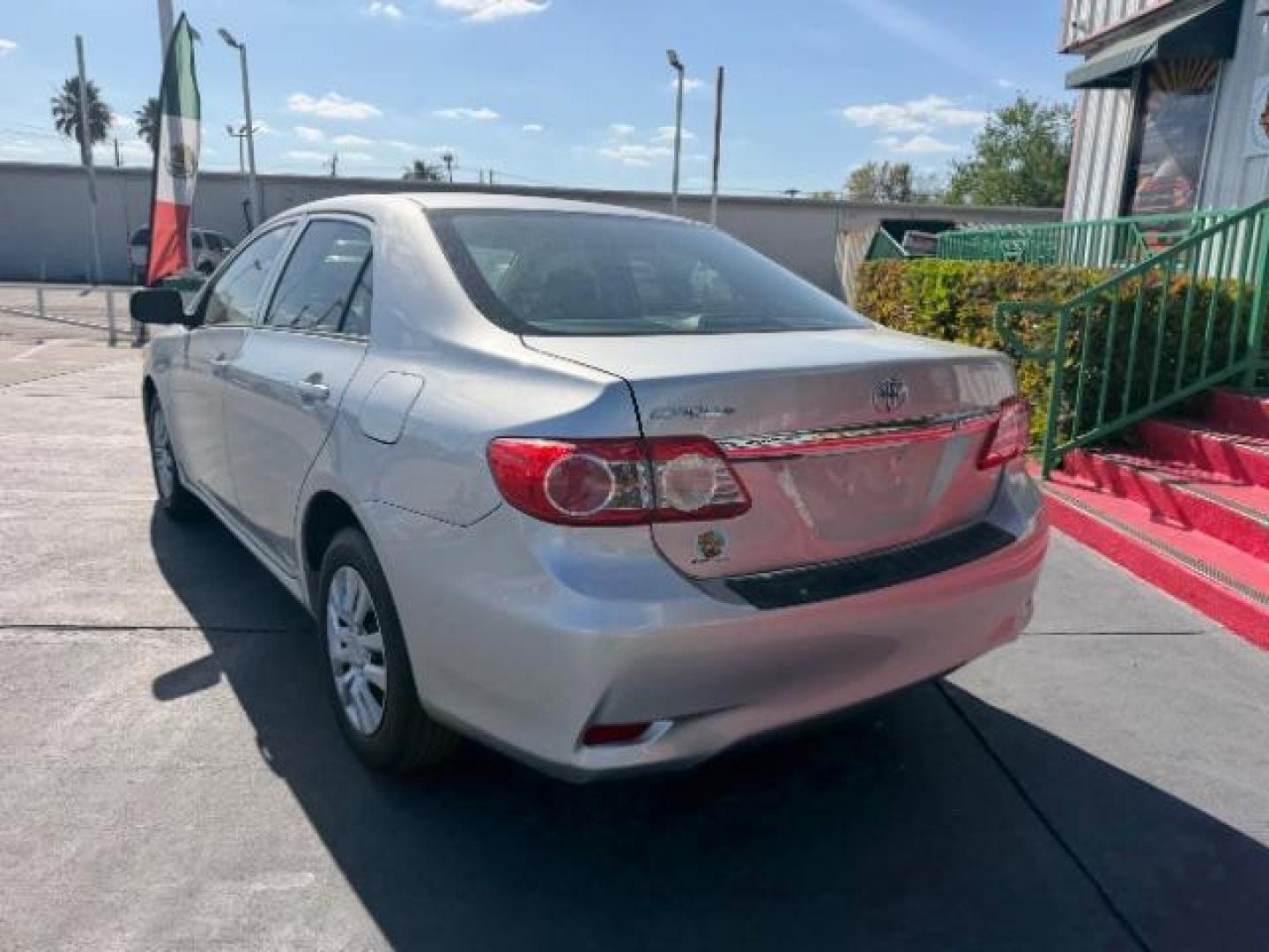 2013 Classic Silver Metallic /Ash Toyota Corolla L (5YFBU4EE9DP) with an 1.8L I-4 DOHC engine, located at 4545 Spencer Hwy., Pasadena, 77504, (832) 266-1645, 29.666037, -95.173775 - Photo#5