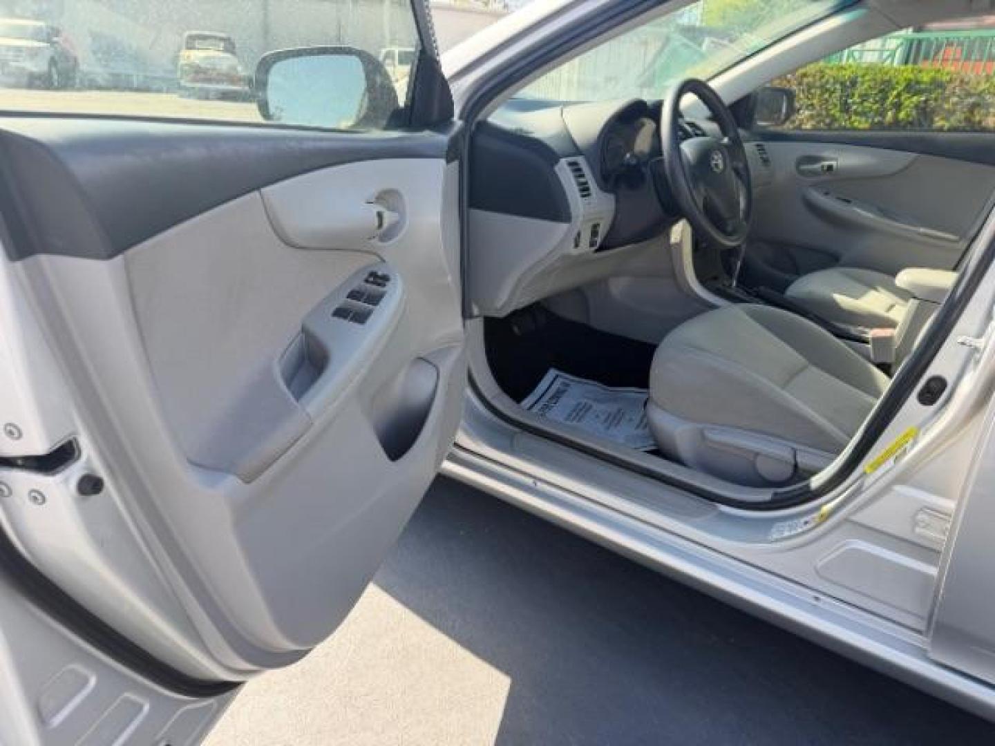 2013 Classic Silver Metallic /Ash Toyota Corolla L (5YFBU4EE9DP) with an 1.8L I-4 DOHC engine, located at 4545 Spencer Hwy., Pasadena, 77504, (832) 266-1645, 29.666037, -95.173775 - Photo#11