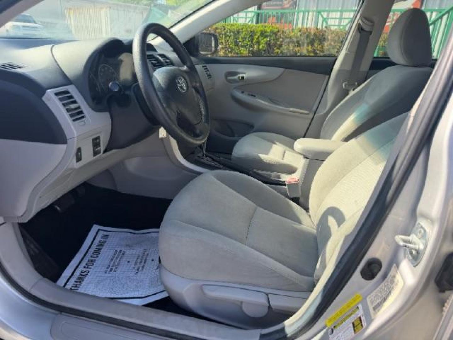 2013 Classic Silver Metallic /Ash Toyota Corolla L (5YFBU4EE9DP) with an 1.8L I-4 DOHC engine, located at 4545 Spencer Hwy., Pasadena, 77504, (832) 266-1645, 29.666037, -95.173775 - Photo#12