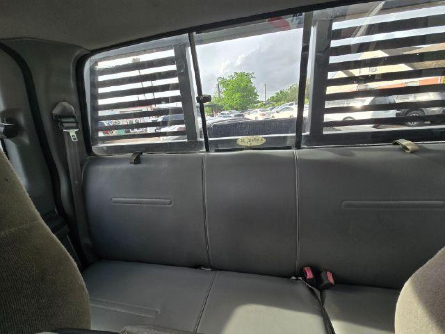 2003 Super White /Medium Parchment Ford F-350 XL (1FTSX31P83E) with an 6.0L Diesel, DI, V8 engine, located at 7935 Gulf Freeway, Houston, 77017, (832) 266-1645, 29.684393, -95.275665 - Photo#6