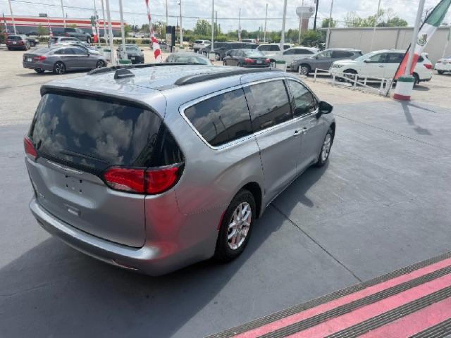 2021 Billet Silver Metallic Clearcoat /Cognac/Alloy/Alloy Chrysler Voyager LXI (2C4RC1DG0MR) with an 3.6L V-6 DOHC engine, located at 4545 Spencer Hwy., Pasadena, 77504, (832) 266-1645, 29.666037, -95.173775 - Photo#4