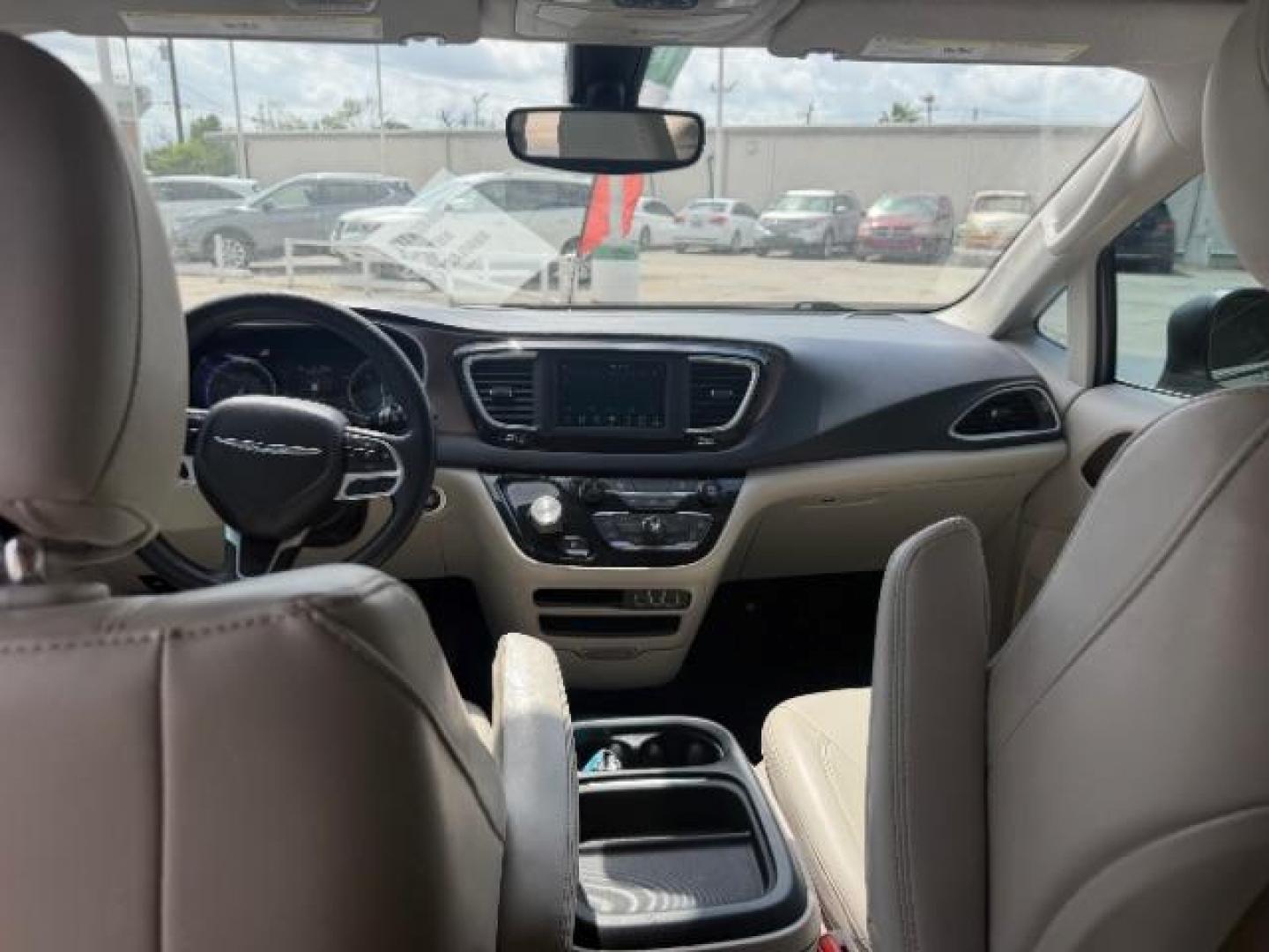 2021 Billet Silver Metallic Clearcoat /Cognac/Alloy/Alloy Chrysler Voyager LXI (2C4RC1DG0MR) with an 3.6L V-6 DOHC engine, located at 4545 Spencer Hwy., Pasadena, 77504, (832) 266-1645, 29.666037, -95.173775 - Photo#9
