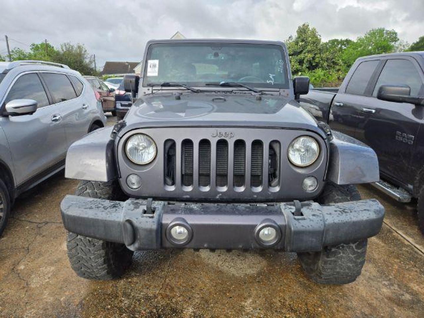 2016 Granite Crystal Metallic Clearcoat Jeep Wrangler Unlimited Freedom (1C4BJWDG6GL) with an Pentastar 3.6L V-6 DOHC engine, located at 7935 Gulf Freeway, Houston, 77017, (832) 266-1645, 29.684393, -95.275665 - Photo#1