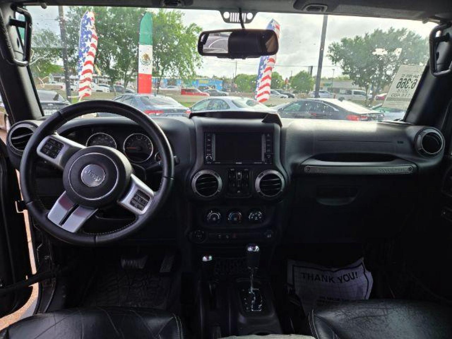 2016 Granite Crystal Metallic Clearcoat Jeep Wrangler Unlimited Freedom (1C4BJWDG6GL) with an Pentastar 3.6L V-6 DOHC engine, located at 7935 Gulf Freeway, Houston, 77017, (832) 266-1645, 29.684393, -95.275665 - Photo#4