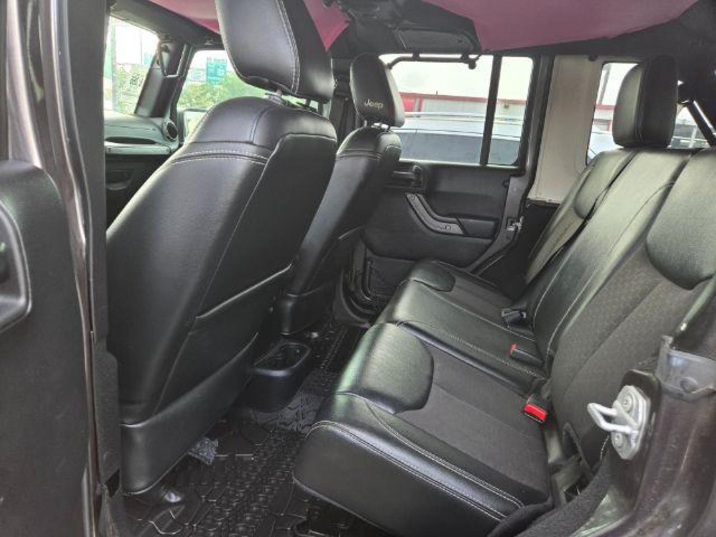 2016 Granite Crystal Metallic Clearcoat Jeep Wrangler Unlimited Freedom (1C4BJWDG6GL) with an Pentastar 3.6L V-6 DOHC engine, located at 7935 Gulf Freeway, Houston, 77017, (832) 266-1645, 29.684393, -95.275665 - Photo#5
