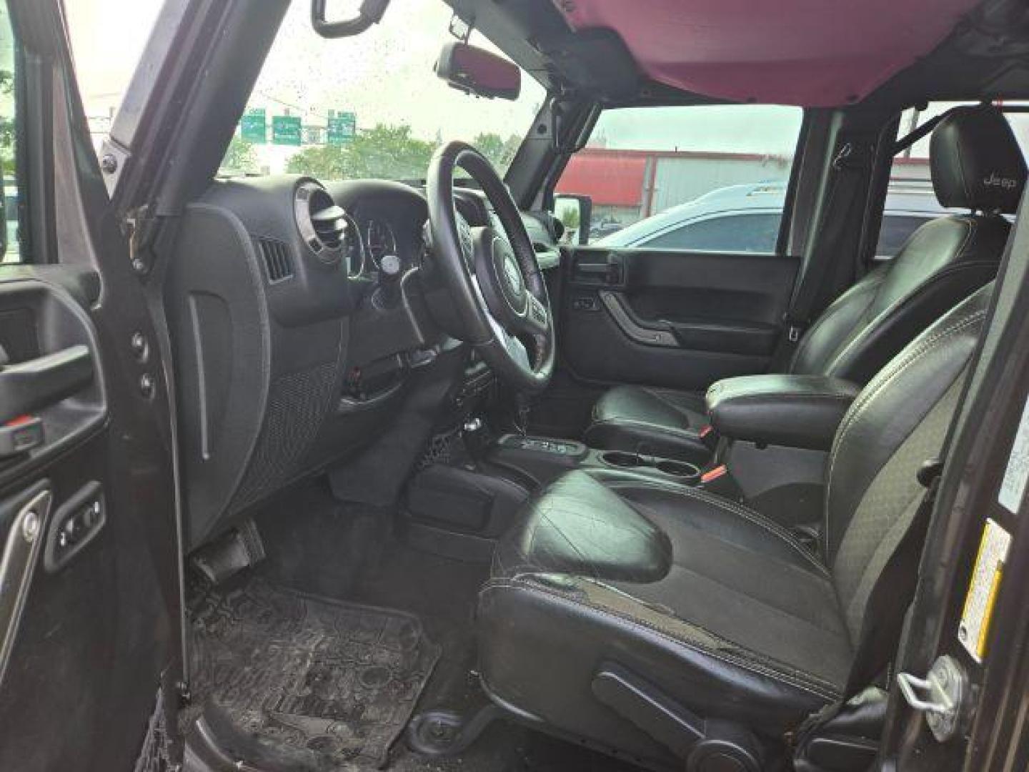 2016 Granite Crystal Metallic Clearcoat Jeep Wrangler Unlimited Freedom (1C4BJWDG6GL) with an Pentastar 3.6L V-6 DOHC engine, located at 7935 Gulf Freeway, Houston, 77017, (832) 266-1645, 29.684393, -95.275665 - Photo#6
