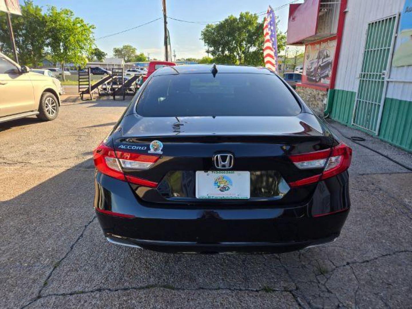 2020 Crystal Black Pearl /Black Honda Accord LX (1HGCV1F16LA) with an 1.5L I-4 gasoline direct injection engine, located at 7935 Gulf Freeway, Houston, 77017, (832) 266-1645, 29.684393, -95.275665 - Photo#2