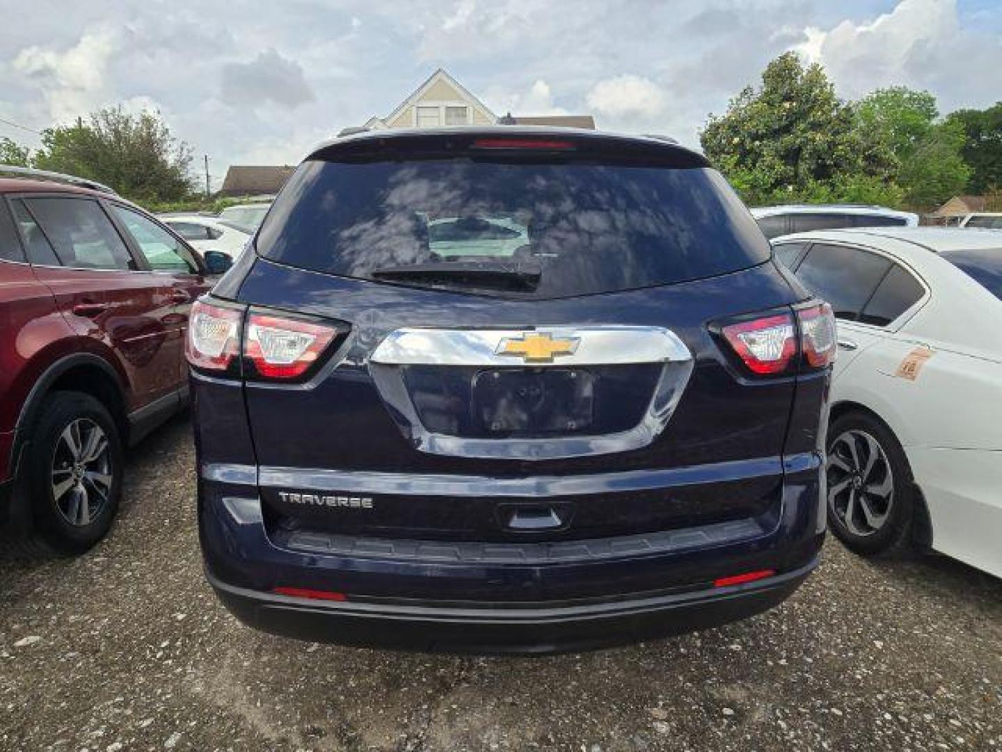 2017 Blue Velvet Metallic Chevrolet Traverse LS FWD w/PDC (1GNKRFEDXHJ) with an 3.6L V6 DOHC 24V engine, 6-Speed Automatic transmission, located at 7935 Gulf Freeway, Houston, 77017, (832) 266-1645, 29.684393, -95.275665 - Photo#5