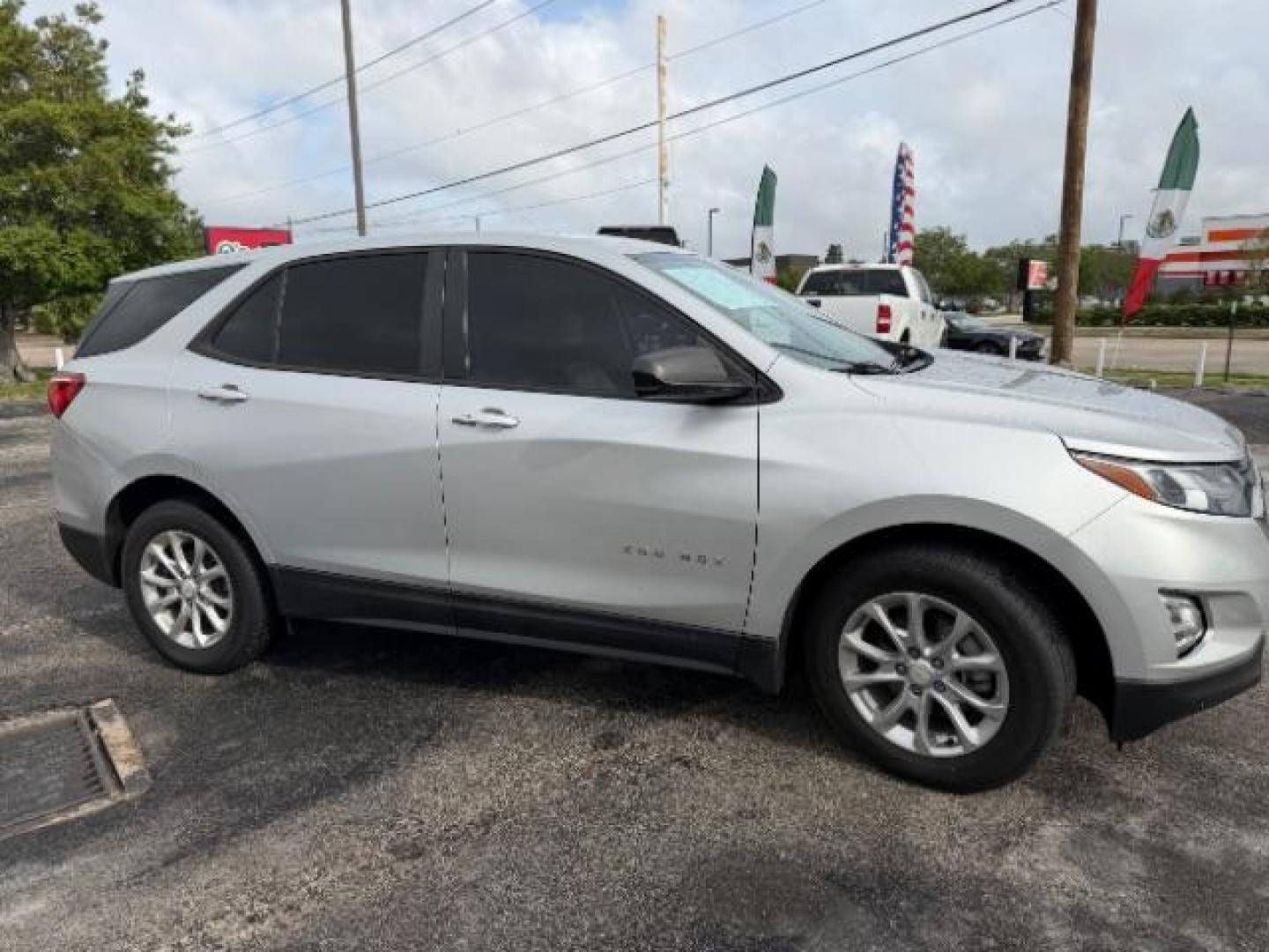 2020 Silver Ice Metallic Chevrolet Equinox FWD LS (2GNAXHEV5L6) with an 1.5L I-4 gasoline direct injection engine, located at 4545 Spencer Hwy., Pasadena, 77504, (832) 266-1645, 29.666037, -95.173775 - Photo#2