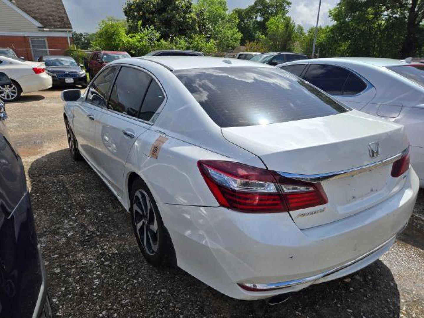 2017 Honda Accord EX-L V6 (1HGCR3F89HA) with an 3.5L V-6 i-VTEC variable valve control engine, located at 7935 Gulf Freeway, Houston, 77017, (832) 266-1645, 29.684393, -95.275665 - Photo#4