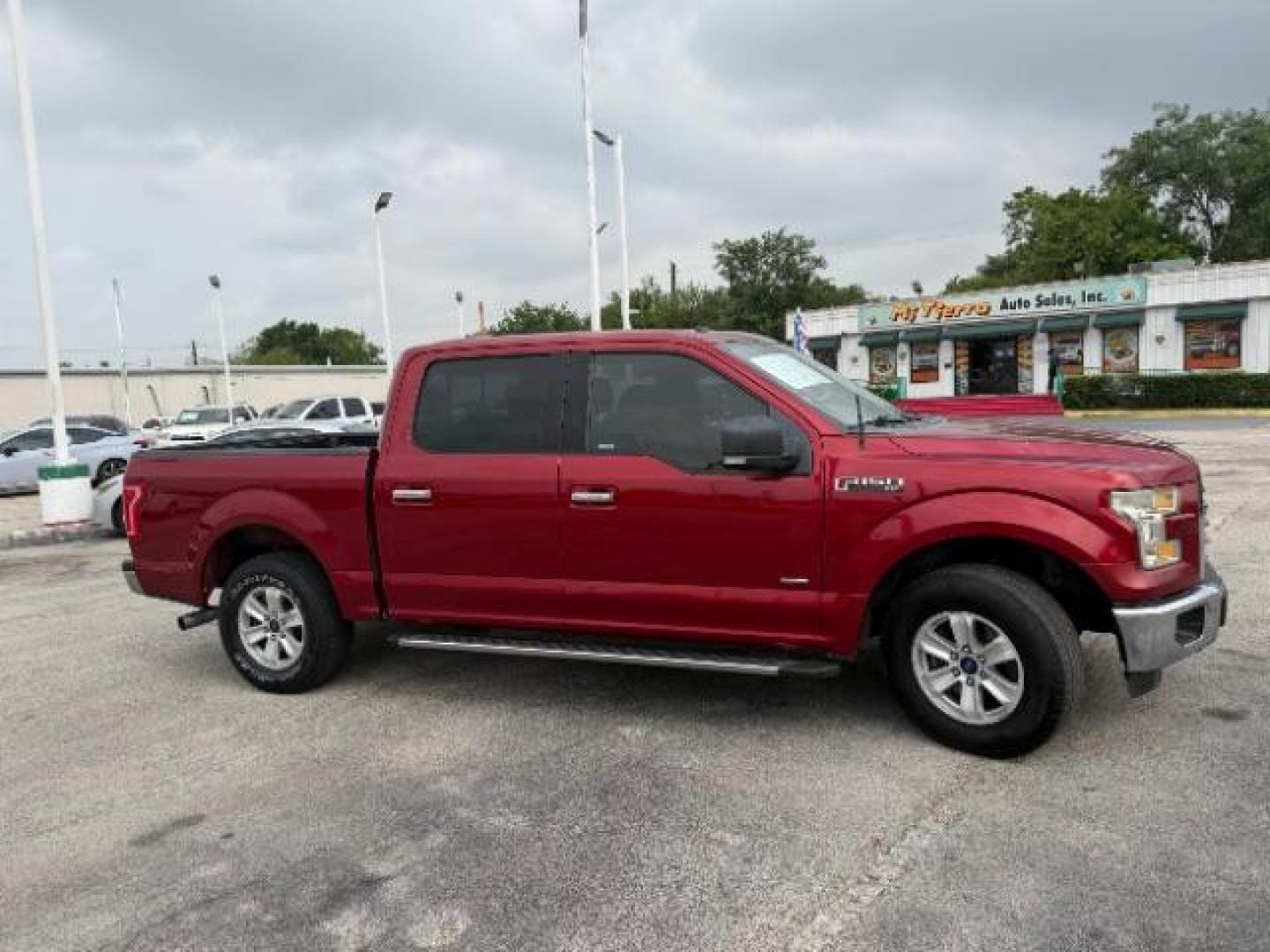 2015 Ruby Red Metallic Tinted Clearcoat /Black Ford F-150 XLT (1FTEW1CP9FK) , located at 7935 Gulf Freeway, Houston, 77017, (832) 266-1645, 29.684393, -95.275665 - Photo#0
