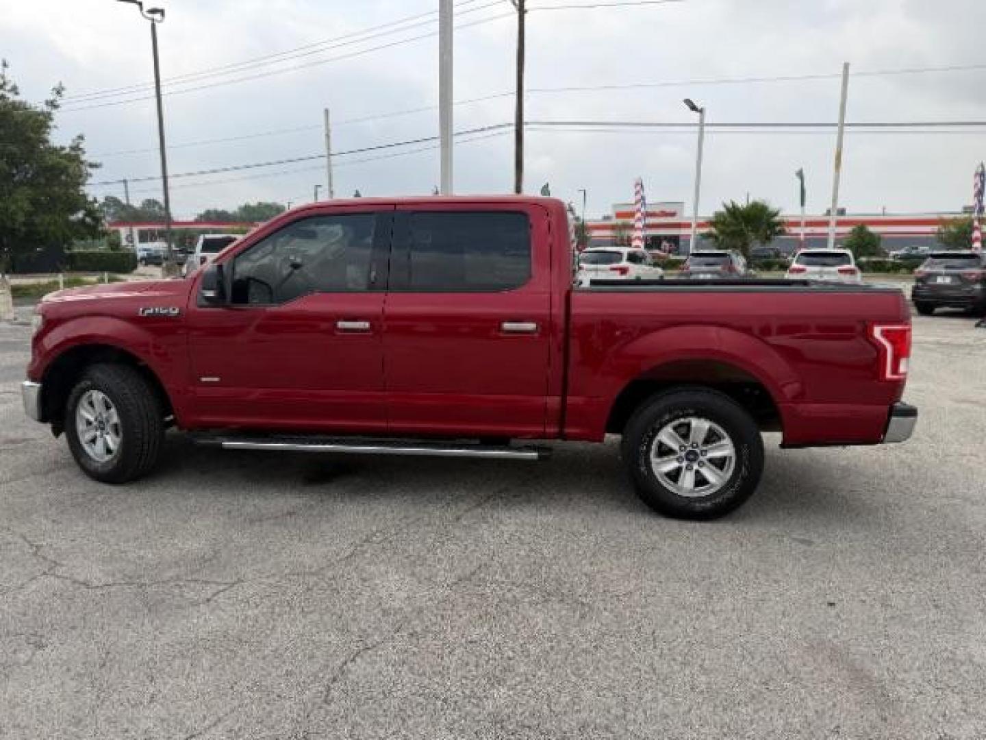 2015 Ruby Red Metallic Tinted Clearcoat /Black Ford F-150 XLT (1FTEW1CP9FK) , located at 7935 Gulf Freeway, Houston, 77017, (832) 266-1645, 29.684393, -95.275665 - Photo#3