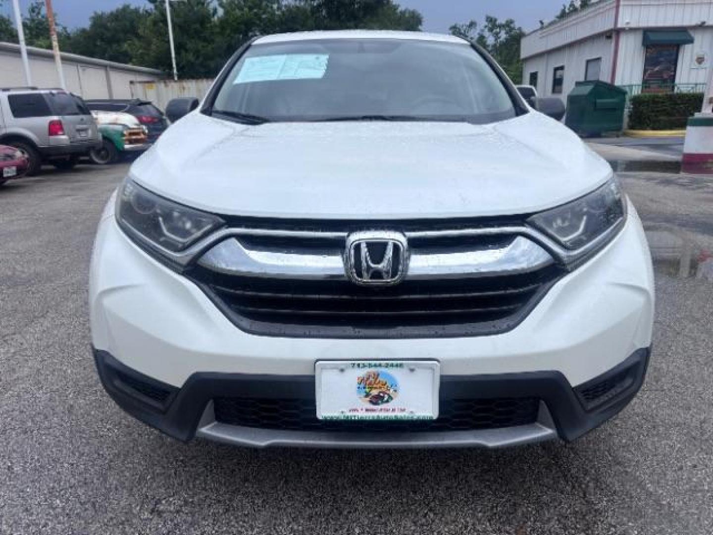 2018 White Diamond Pearl Honda CR-V LX (5J6RW5H30JL) with an 2.4L I-4 gasoline direct injection engine, located at 4545 Spencer Hwy., Pasadena, 77504, (832) 266-1645, 29.666037, -95.173775 - Photo#2