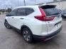 2018 White Diamond Pearl Honda CR-V LX (5J6RW5H30JL) with an 2.4L I-4 gasoline direct injection engine, located at 4545 Spencer Hwy., Pasadena, 77504, (832) 266-1645, 29.666037, -95.173775 - Photo#5