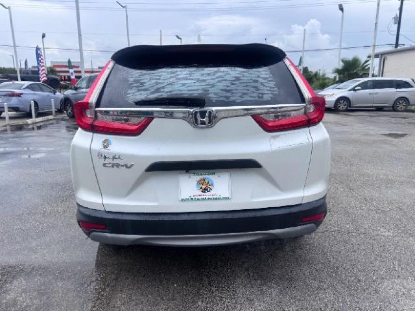 2018 White Diamond Pearl Honda CR-V LX (5J6RW5H30JL) with an 2.4L I-4 gasoline direct injection engine, located at 4545 Spencer Hwy., Pasadena, 77504, (832) 266-1645, 29.666037, -95.173775 - Photo#6
