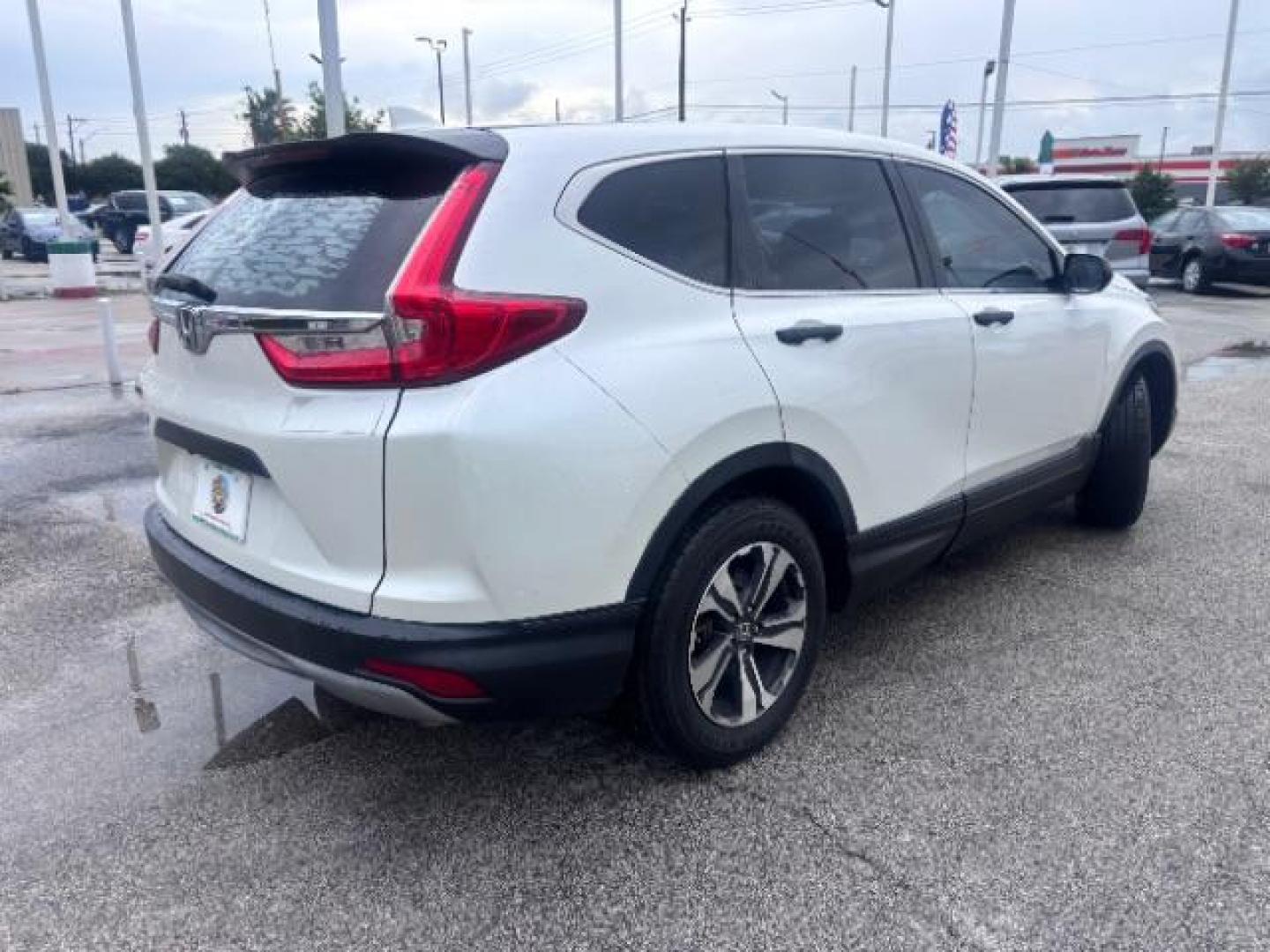2018 White Diamond Pearl Honda CR-V LX (5J6RW5H30JL) with an 2.4L I-4 gasoline direct injection engine, located at 4545 Spencer Hwy., Pasadena, 77504, (832) 266-1645, 29.666037, -95.173775 - Photo#7
