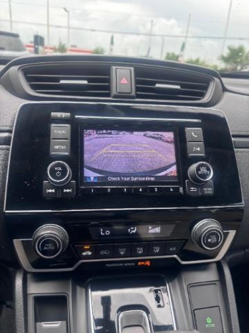 2018 White Diamond Pearl Honda CR-V LX (5J6RW5H30JL) with an 2.4L I-4 gasoline direct injection engine, located at 4545 Spencer Hwy., Pasadena, 77504, (832) 266-1645, 29.666037, -95.173775 - Photo#12