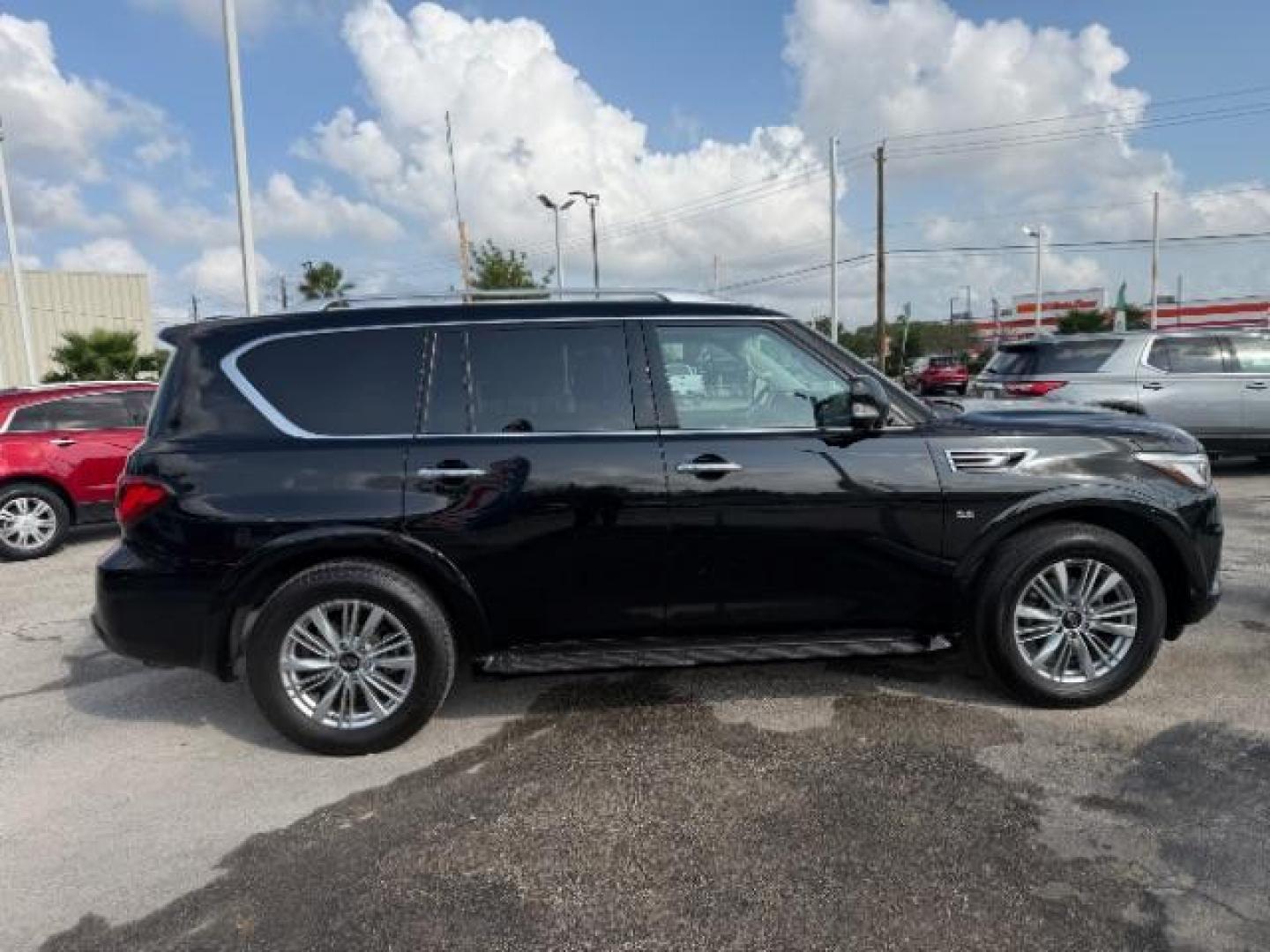 2019 Black Obsidian /Graphite INFINITI QX80 LUXE (JN8AZ2NE7K9) with an 5.6L V-8 gasoline direct injection engine, located at 4545 Spencer Hwy., Pasadena, 77504, (832) 266-1645, 29.666037, -95.173775 - Photo#2