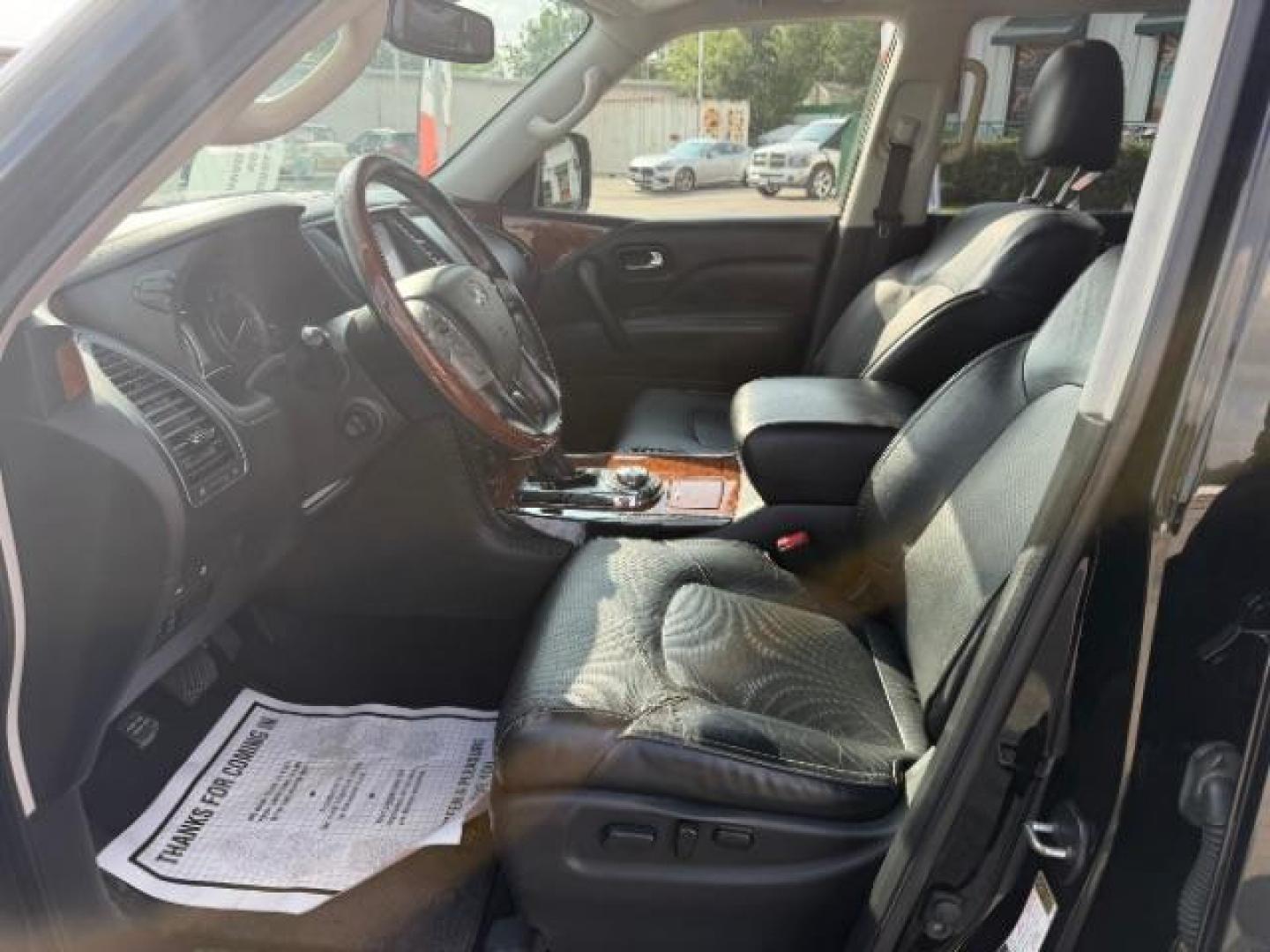 2019 Black Obsidian /Graphite INFINITI QX80 LUXE (JN8AZ2NE7K9) with an 5.6L V-8 gasoline direct injection engine, located at 4545 Spencer Hwy., Pasadena, 77504, (832) 266-1645, 29.666037, -95.173775 - Photo#4
