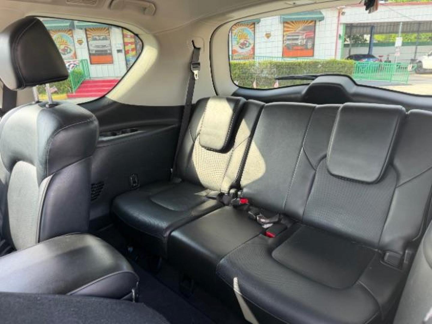2019 Black Obsidian /Graphite INFINITI QX80 LUXE (JN8AZ2NE7K9) with an 5.6L V-8 gasoline direct injection engine, located at 4545 Spencer Hwy., Pasadena, 77504, (832) 266-1645, 29.666037, -95.173775 - Photo#8