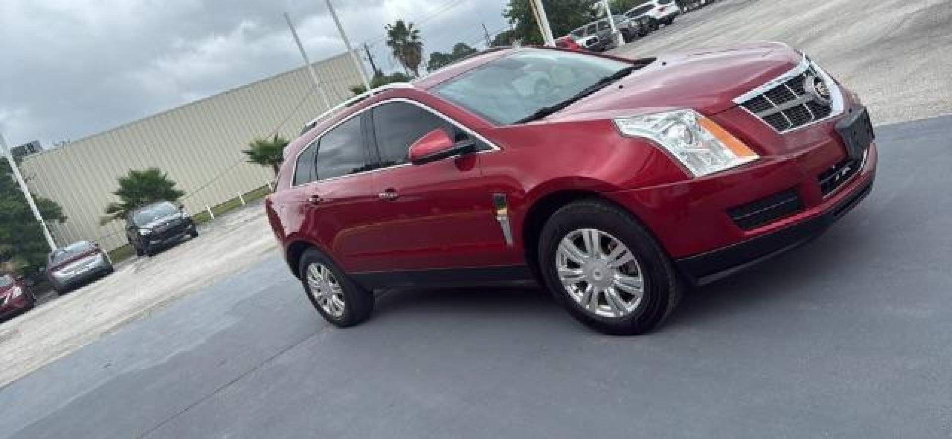 2011 Crystal Red Tintcoat /Shale/Ebony Leather Cadillac SRX Luxury Collection (3GYFNAEY5BS) with an 3.0L V6 DOHC 24V engine, 6-Speed Automatic transmission, located at 4545 Spencer Hwy., Pasadena, 77504, (832) 266-1645, 29.666037, -95.173775 - Photo#1
