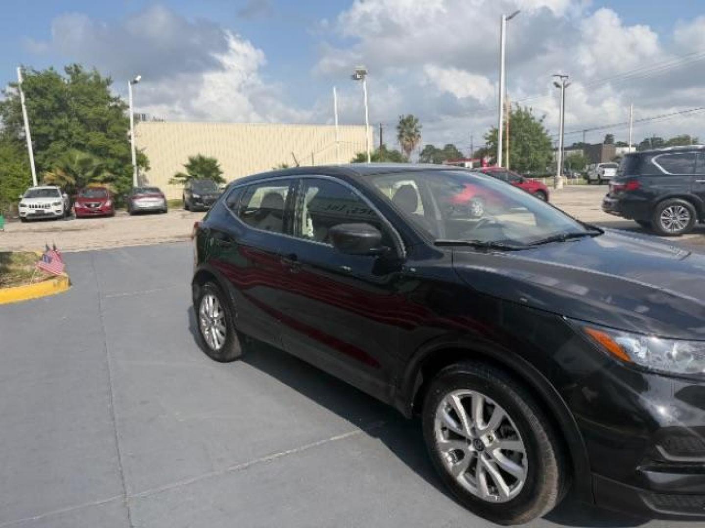 2021 Magnetic Black Pearl /Charcoal Nissan Rogue Sport S AWD Xtronic CVT (JN1BJ1AWXMW) with an 2L I-4 gasoline direct injection engine, located at 4545 Spencer Hwy., Pasadena, 77504, (832) 266-1645, 29.666037, -95.173775 - Photo#3