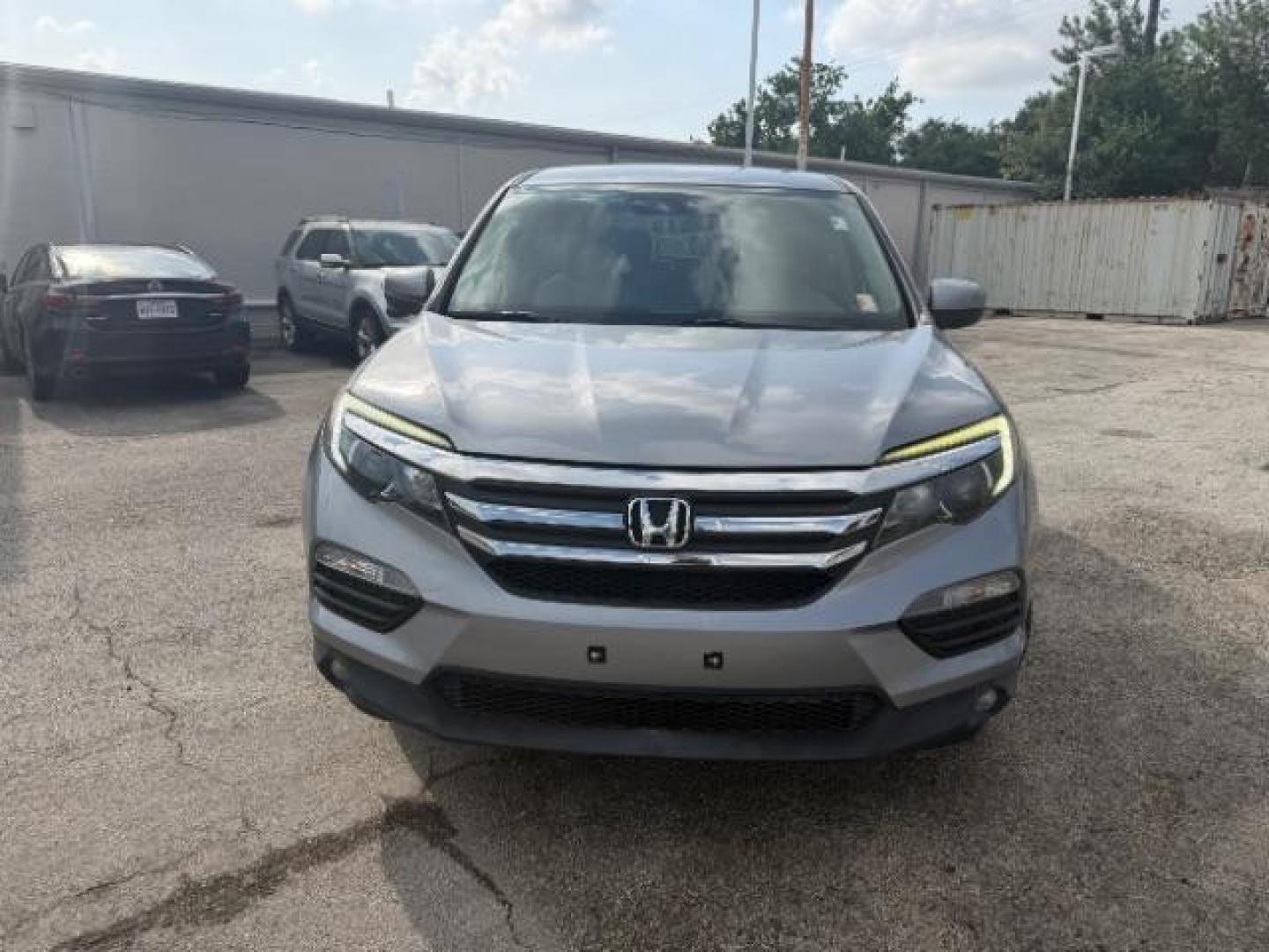 2018 Lunar Silver Metallic /Black Honda Pilot EX (5FNYF5H32JB) with an 3.5L V-6 gasoline direct injection engine, located at 4545 Spencer Hwy., Pasadena, 77504, (832) 266-1645, 29.666037, -95.173775 - Photo#1