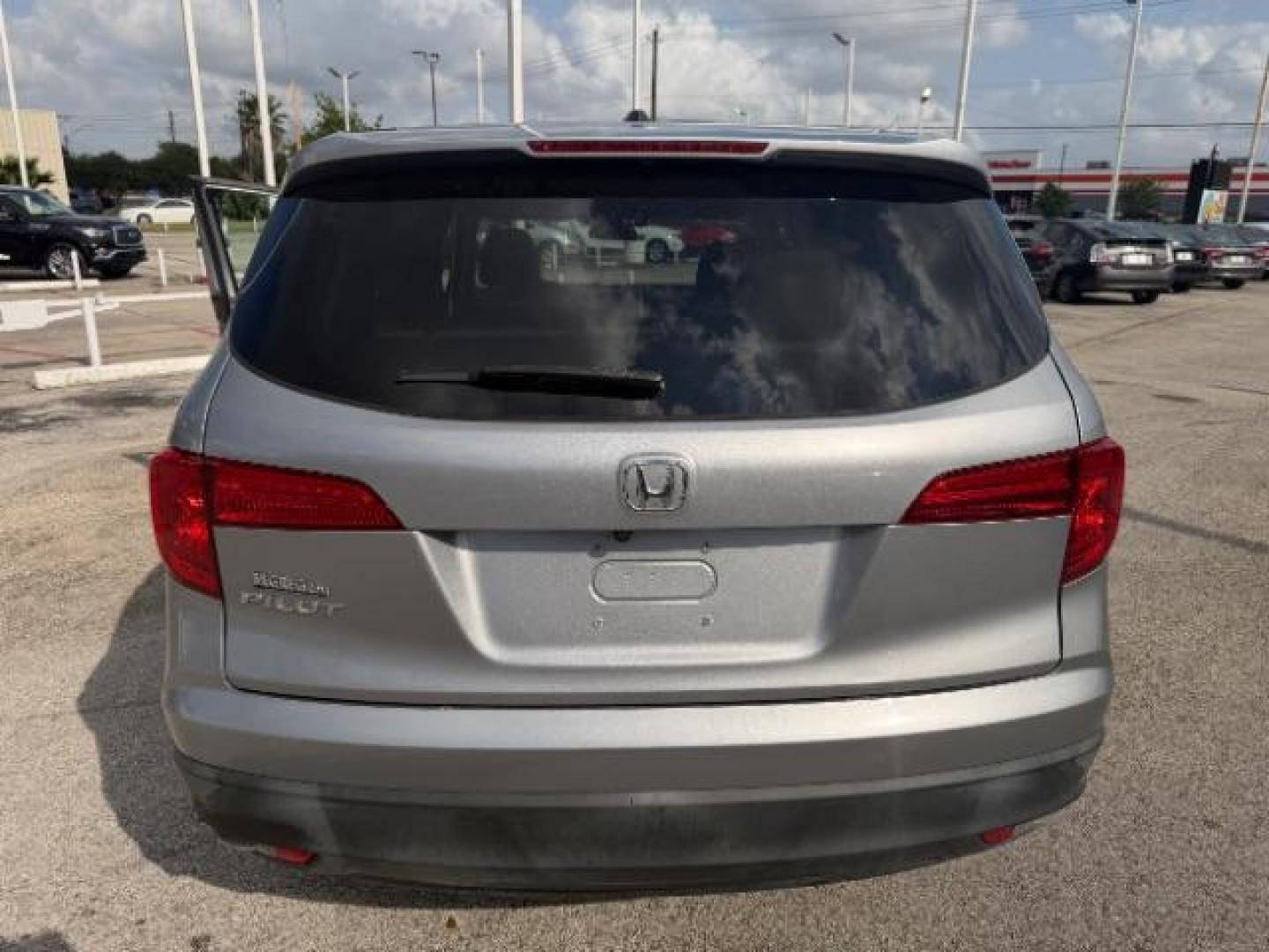 2018 Lunar Silver Metallic /Black Honda Pilot EX (5FNYF5H32JB) with an 3.5L V-6 gasoline direct injection engine, located at 4545 Spencer Hwy., Pasadena, 77504, (832) 266-1645, 29.666037, -95.173775 - Photo#3