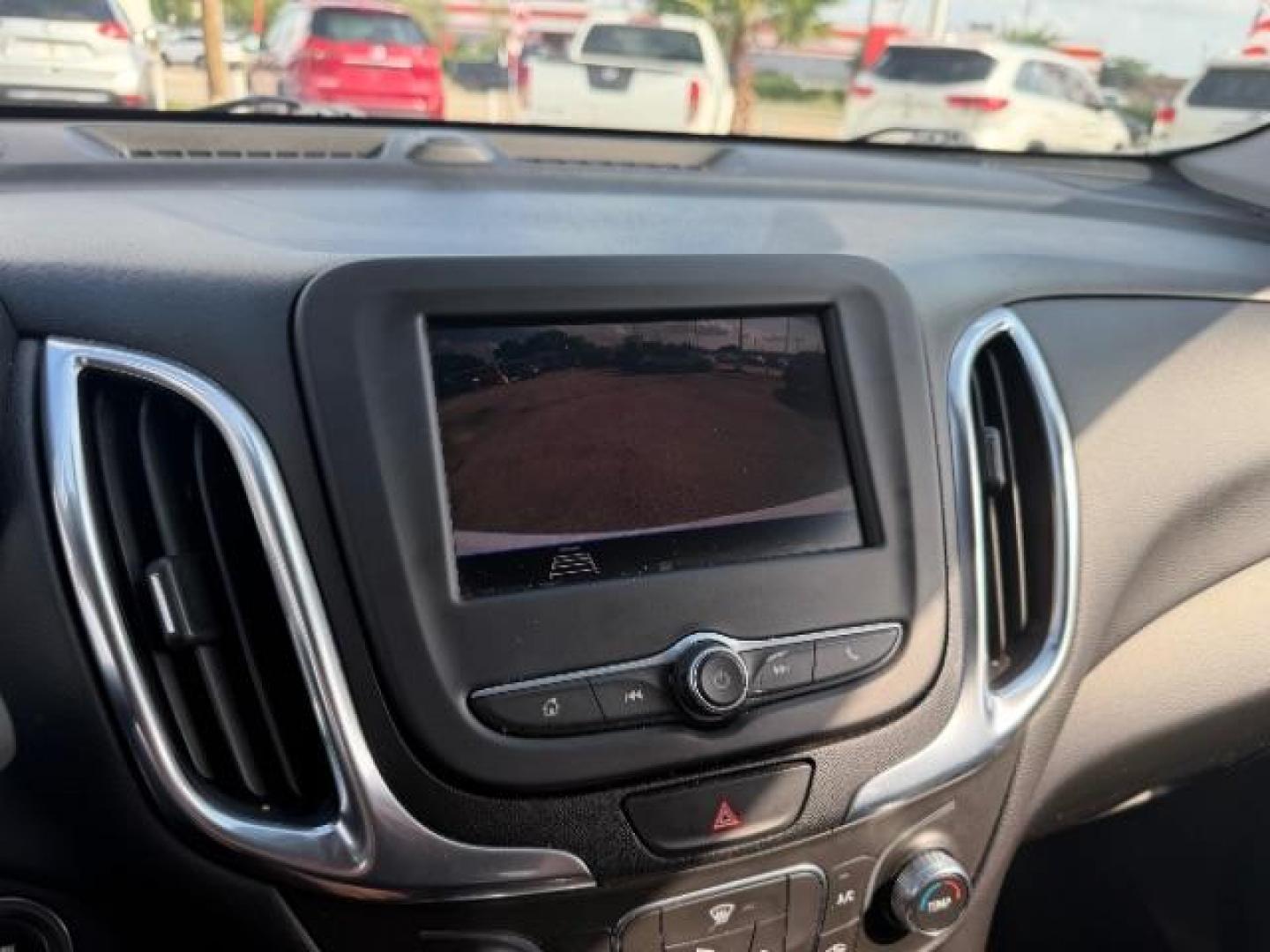 2021 Summit White /Jet Black Chevrolet Equinox FWD LT (2GNAXKEV5M6) with an 1.5L I-4 gasoline direct injection engine, located at 4545 Spencer Hwy., Pasadena, 77504, (832) 266-1645, 29.666037, -95.173775 - Photo#5
