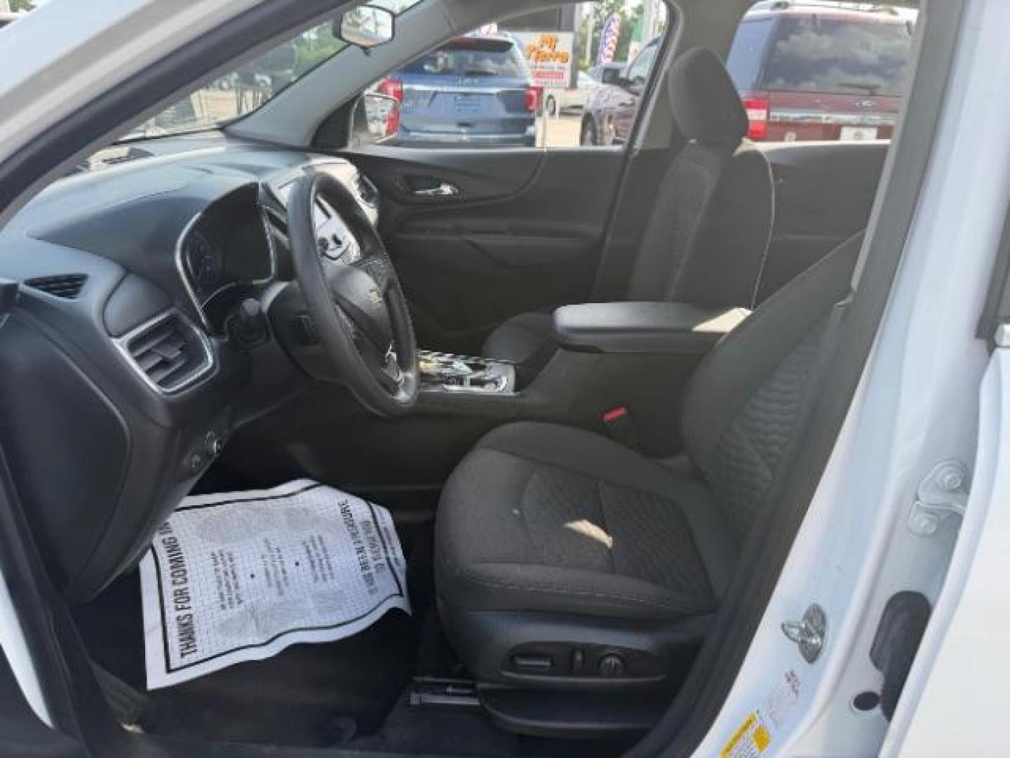 2021 Summit White /Jet Black Chevrolet Equinox FWD LT (2GNAXKEV5M6) with an 1.5L I-4 gasoline direct injection engine, located at 4545 Spencer Hwy., Pasadena, 77504, (832) 266-1645, 29.666037, -95.173775 - Photo#6