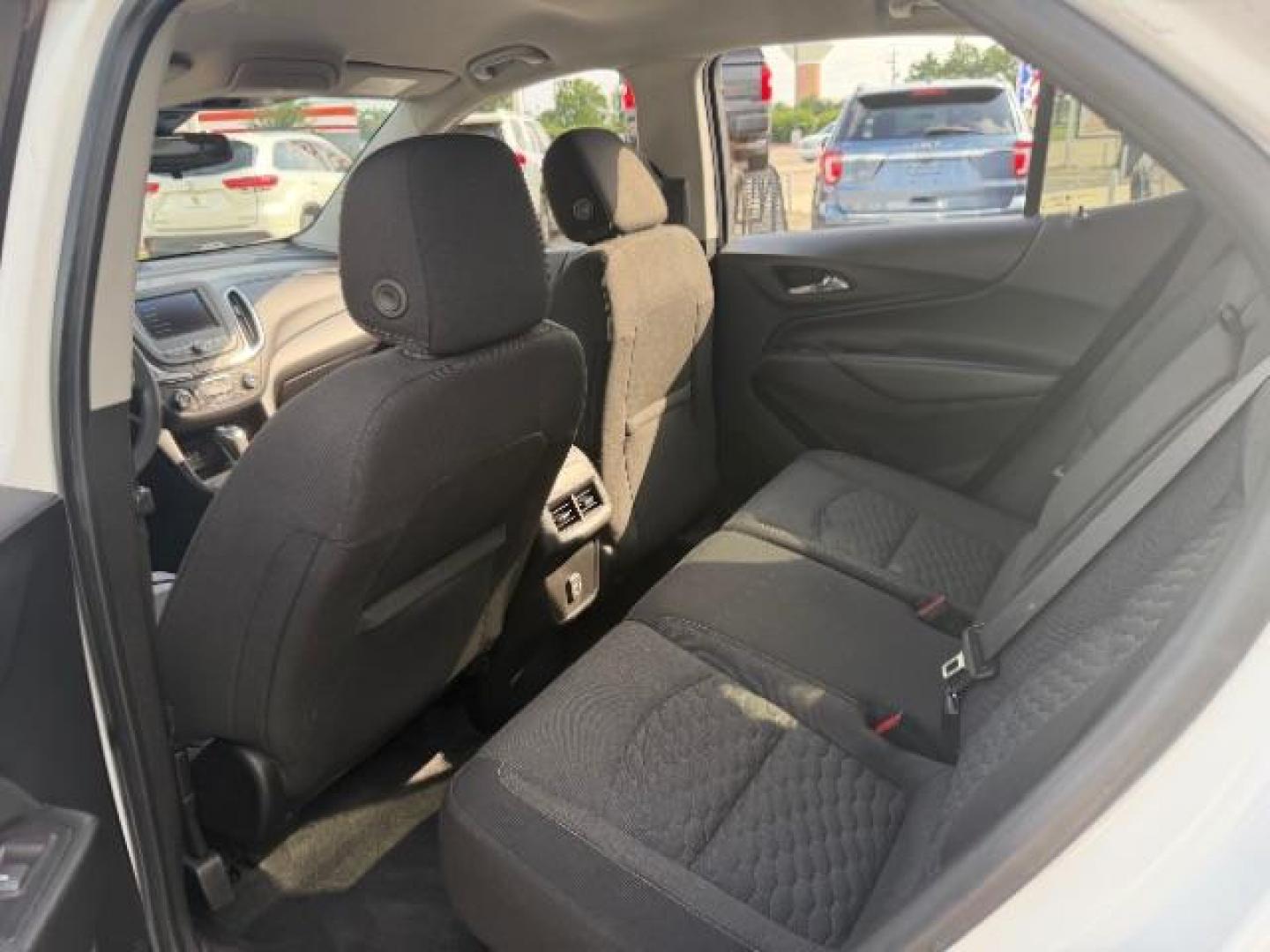 2021 Summit White /Jet Black Chevrolet Equinox FWD LT (2GNAXKEV5M6) with an 1.5L I-4 gasoline direct injection engine, located at 4545 Spencer Hwy., Pasadena, 77504, (832) 266-1645, 29.666037, -95.173775 - Photo#7