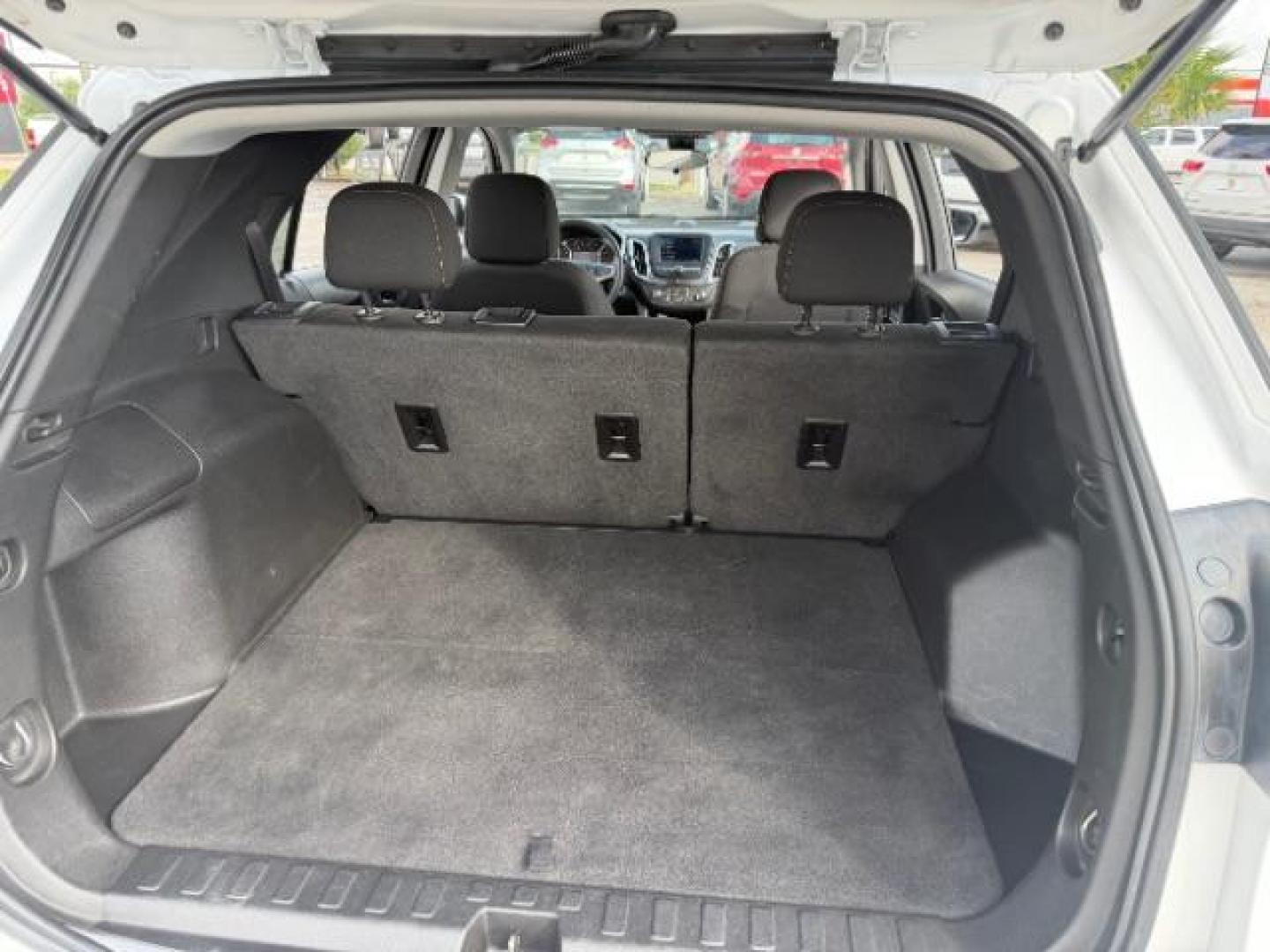 2021 Summit White /Jet Black Chevrolet Equinox FWD LT (2GNAXKEV5M6) with an 1.5L I-4 gasoline direct injection engine, located at 4545 Spencer Hwy., Pasadena, 77504, (832) 266-1645, 29.666037, -95.173775 - Photo#8