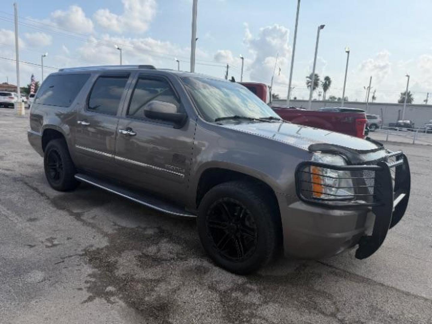 2013 Mocha Steel Metallic /Cocoa/Light Cashmere Leather Interior GMC Yukon Denali XL 4WD (1GKS2MEF9DR) with an 6.2L V8 OHV 16V engine, 6-Speed Automatic transmission, located at 4545 Spencer Hwy., Pasadena, 77504, (832) 266-1645, 29.666037, -95.173775 - Photo#2