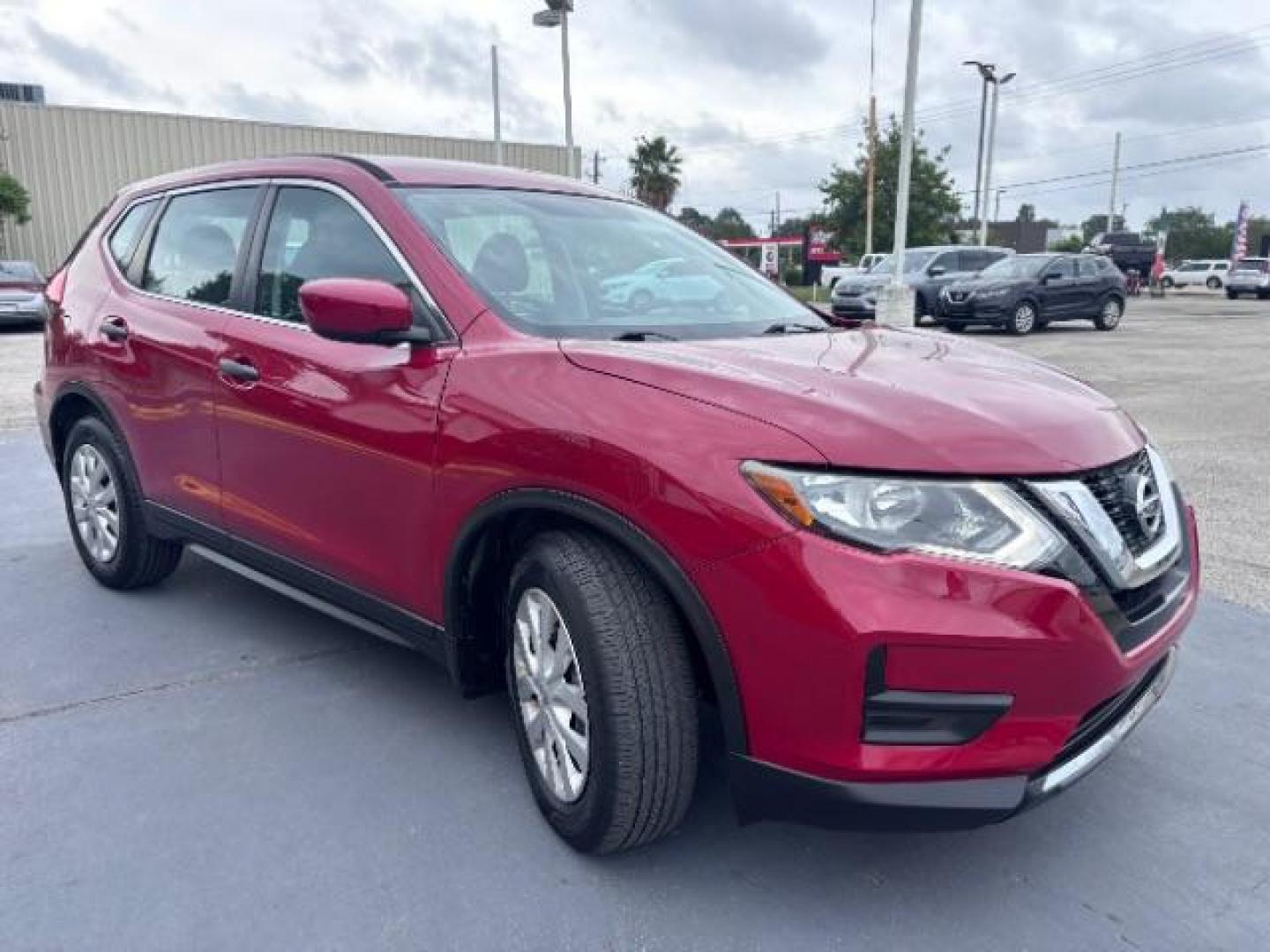 2017 Palatial Ruby /Charcoal Nissan Rogue S (5N1AT2MT6HC) with an 2.5L I-4 DOHC engine, located at 4545 Spencer Hwy., Pasadena, 77504, (832) 266-1645, 29.666037, -95.173775 - Photo#2