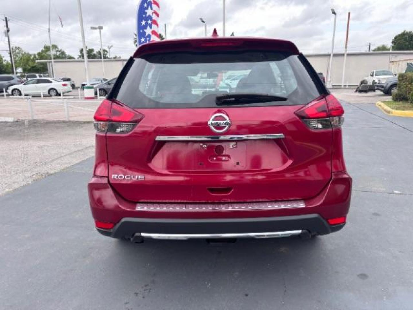 2017 Palatial Ruby /Charcoal Nissan Rogue S (5N1AT2MT6HC) with an 2.5L I-4 DOHC engine, located at 4545 Spencer Hwy., Pasadena, 77504, (832) 266-1645, 29.666037, -95.173775 - Photo#5
