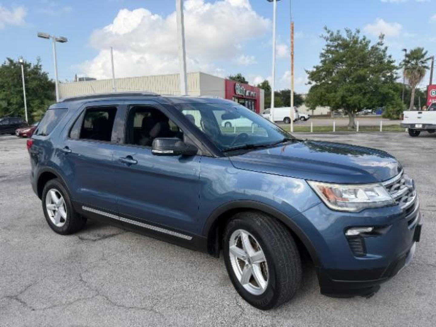 2018 Blue Metallic /Ebony Black Ford Explorer XLT (1FM5K7D86JG) with an EcoBoost 2.3L I-4 gasoline direct injection engine, located at 4545 Spencer Hwy., Pasadena, 77504, (832) 266-1645, 29.666037, -95.173775 - Photo#2