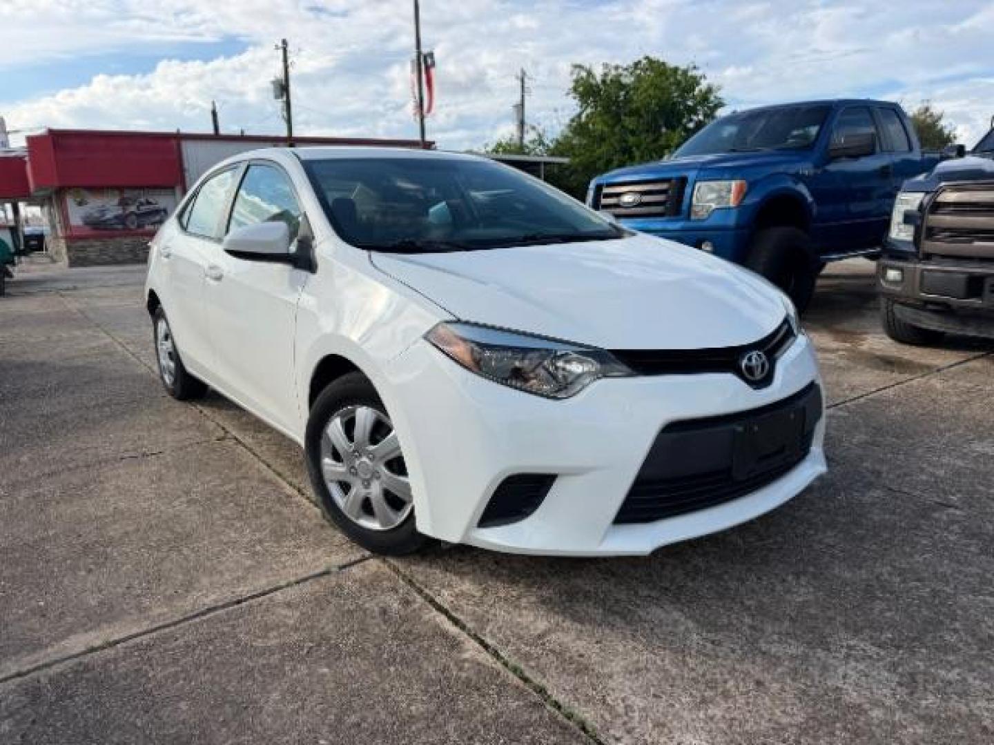 2014 Super White Toyota Corolla LE (5YFBURHE5EP) with an 1.8L I-4 DOHC engine, located at 7935 Gulf Freeway, Houston, 77017, (832) 266-1645, 29.684393, -95.275665- Photo#0
