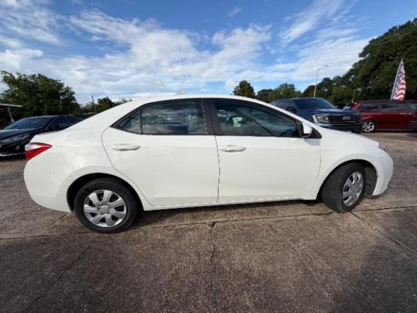 2014 Super White Toyota Corolla LE (5YFBURHE5EP) with an 1.8L I-4 DOHC engine, located at 7935 Gulf Freeway, Houston, 77017, (832) 266-1645, 29.684393, -95.275665- Photo#7