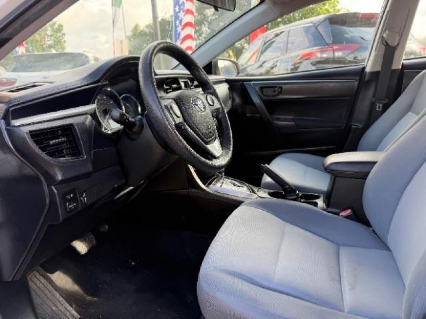 2014 Super White Toyota Corolla LE (5YFBURHE5EP) with an 1.8L I-4 DOHC engine, located at 7935 Gulf Freeway, Houston, 77017, (832) 266-1645, 29.684393, -95.275665- Photo#8