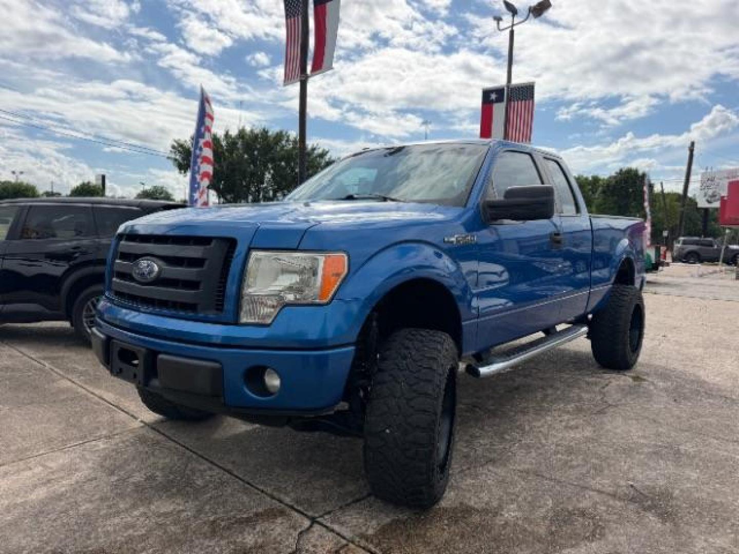 2012 Blue Flame Metallic Ford F-150 STX (1FTFX1CF9CK) with an 5L V-8 DOHC engine, located at 7935 Gulf Freeway, Houston, 77017, (832) 266-1645, 29.684393, -95.275665- Photo#2