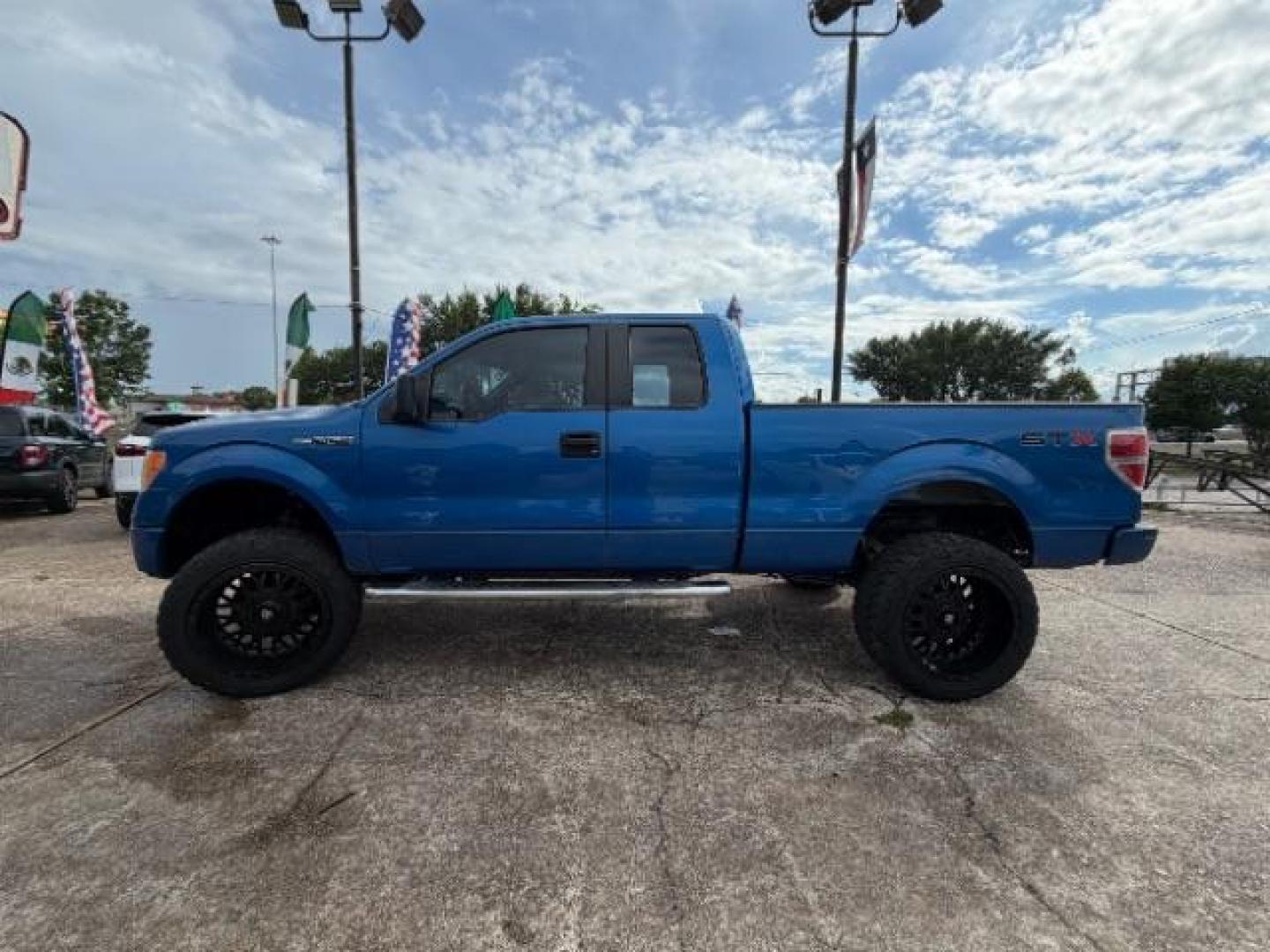 2012 Blue Flame Metallic Ford F-150 STX (1FTFX1CF9CK) with an 5L V-8 DOHC engine, located at 7935 Gulf Freeway, Houston, 77017, (832) 266-1645, 29.684393, -95.275665- Photo#3
