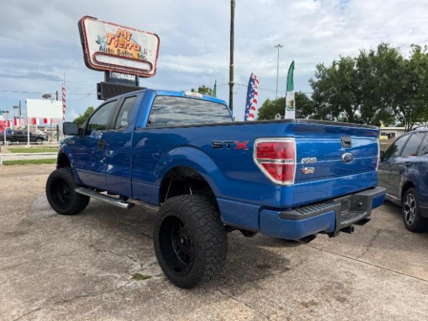 2012 Blue Flame Metallic Ford F-150 STX (1FTFX1CF9CK) with an 5L V-8 DOHC engine, located at 7935 Gulf Freeway, Houston, 77017, (832) 266-1645, 29.684393, -95.275665- Photo#4