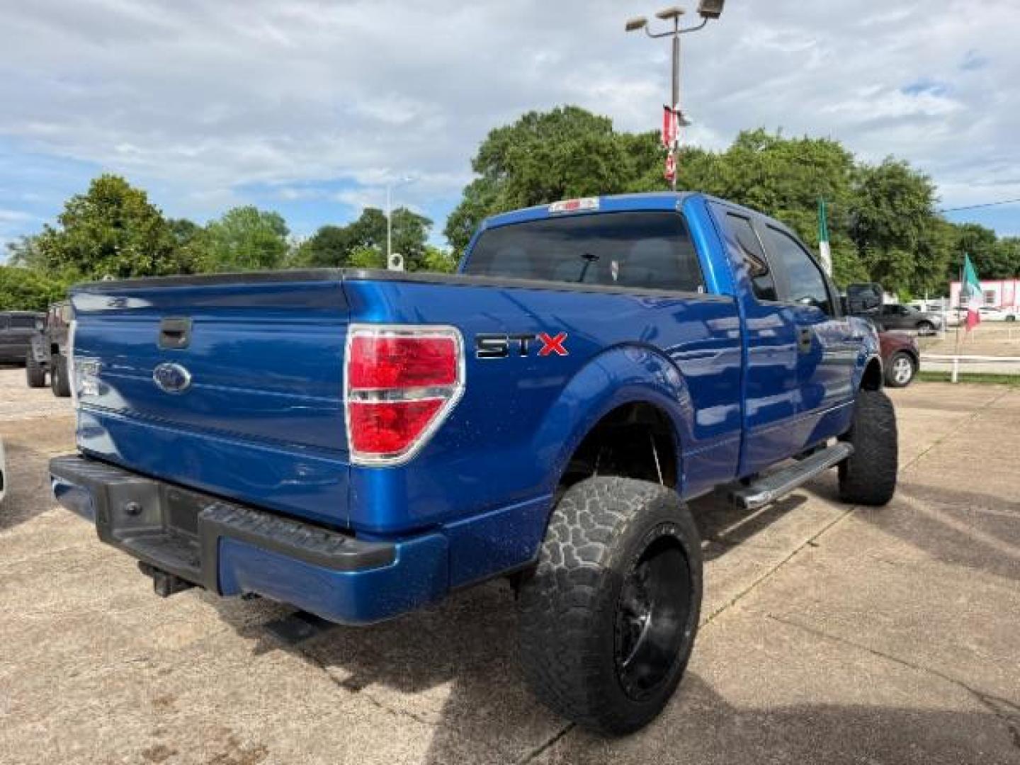 2012 Blue Flame Metallic Ford F-150 STX (1FTFX1CF9CK) with an 5L V-8 DOHC engine, located at 7935 Gulf Freeway, Houston, 77017, (832) 266-1645, 29.684393, -95.275665- Photo#6