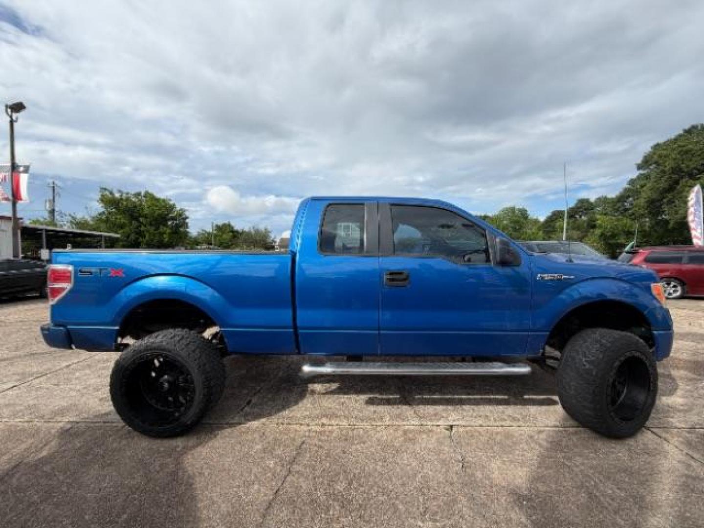 2012 Blue Flame Metallic Ford F-150 STX (1FTFX1CF9CK) with an 5L V-8 DOHC engine, located at 7935 Gulf Freeway, Houston, 77017, (832) 266-1645, 29.684393, -95.275665- Photo#7