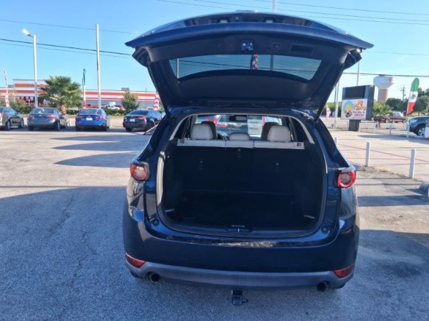 2019 Eternal Blue Mica /Parchment, leather Mazda CX-5 Grand Touring (JM3KFADM4K1) with an 2.5L L4 DOHC 16V engine, 6-Speed Automatic transmission, located at 4545 Spencer Hwy., Pasadena, 77504, (832) 266-1645, 29.666037, -95.173775- Photo#5