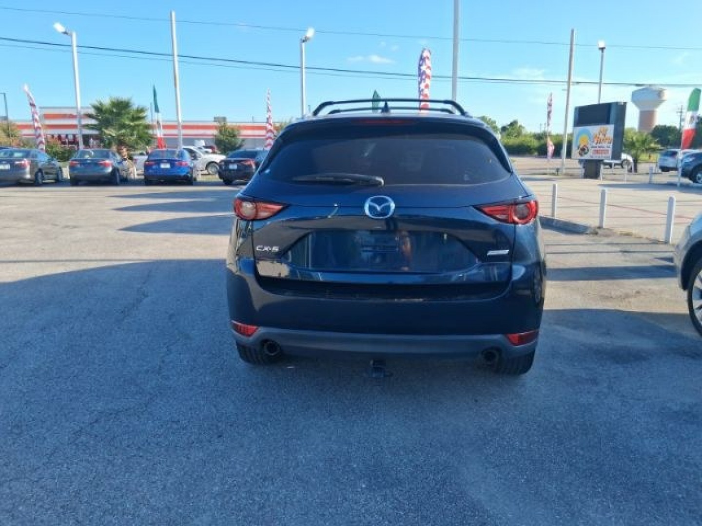 2019 Eternal Blue Mica /Parchment, leather Mazda CX-5 Grand Touring (JM3KFADM4K1) with an 2.5L L4 DOHC 16V engine, 6-Speed Automatic transmission, located at 4545 Spencer Hwy., Pasadena, 77504, (832) 266-1645, 29.666037, -95.173775- Photo#6