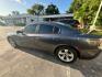 2015 Granite Crystal Meta /Black Dodge Charger SE (2C3CDXBGXFH) with an 3.6L V-6 DOHC engine, located at 4545 Spencer Hwy., Pasadena, 77504, (832) 266-1645, 29.666037, -95.173775- Photo#2