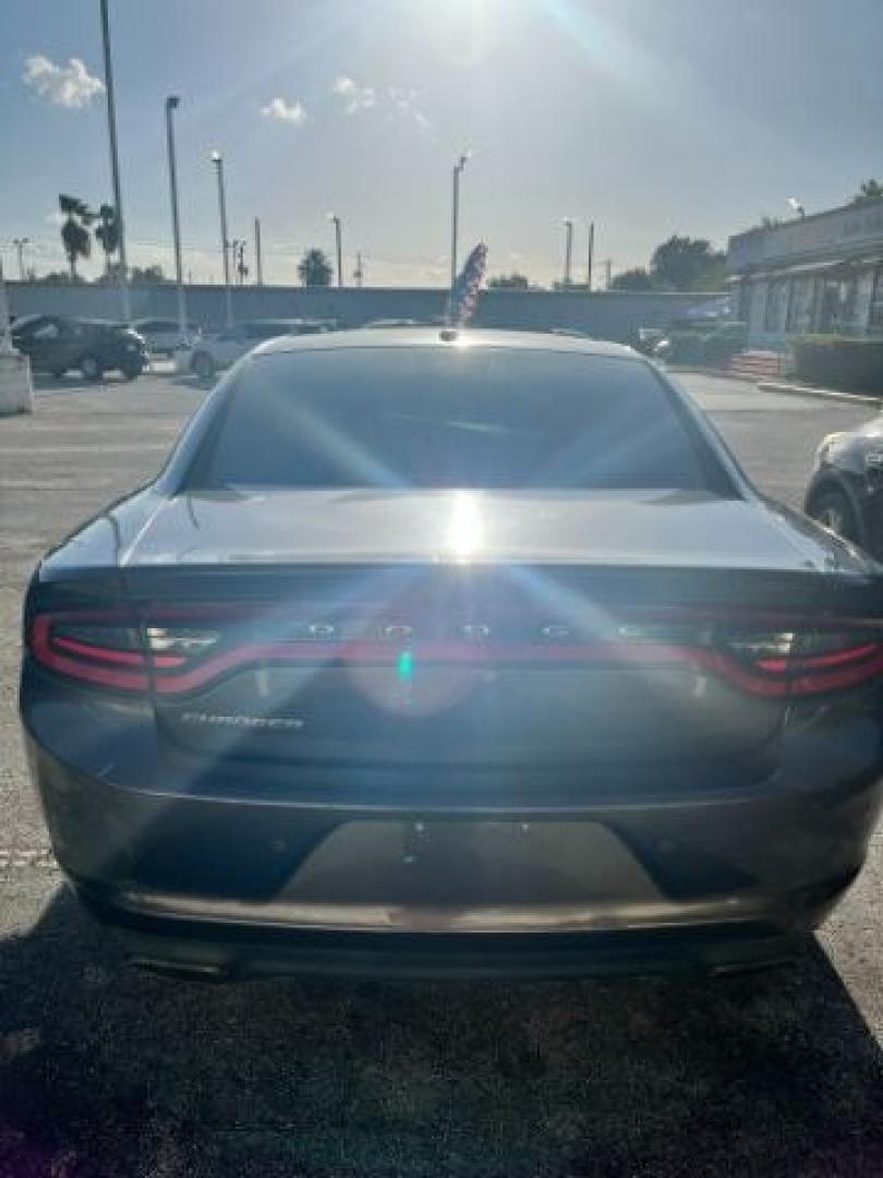 2015 Granite Crystal Meta /Black Dodge Charger SE (2C3CDXBGXFH) with an 3.6L V-6 DOHC engine, located at 4545 Spencer Hwy., Pasadena, 77504, (832) 266-1645, 29.666037, -95.173775- Photo#3